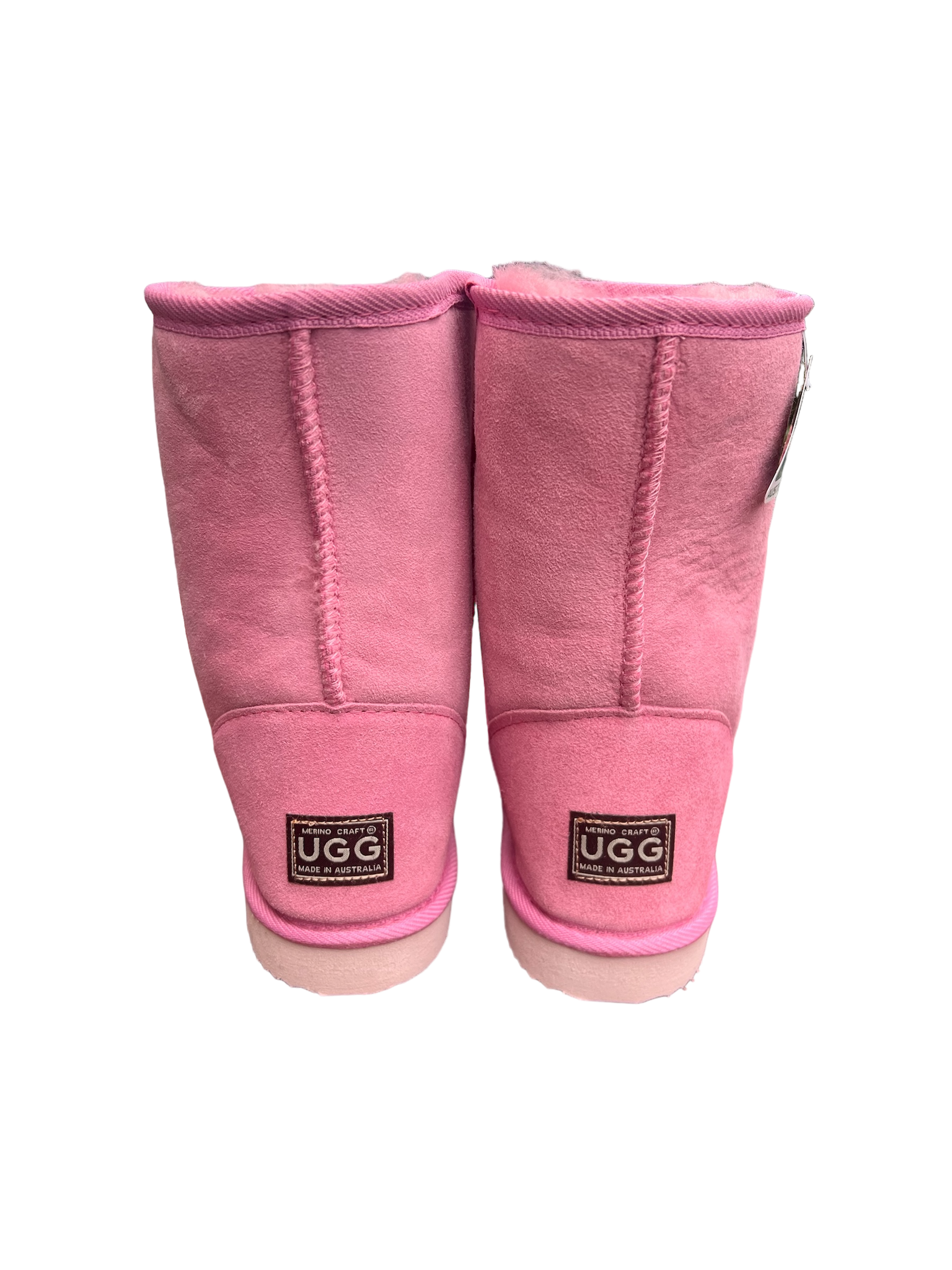 Pink fluffy ugg boots discount